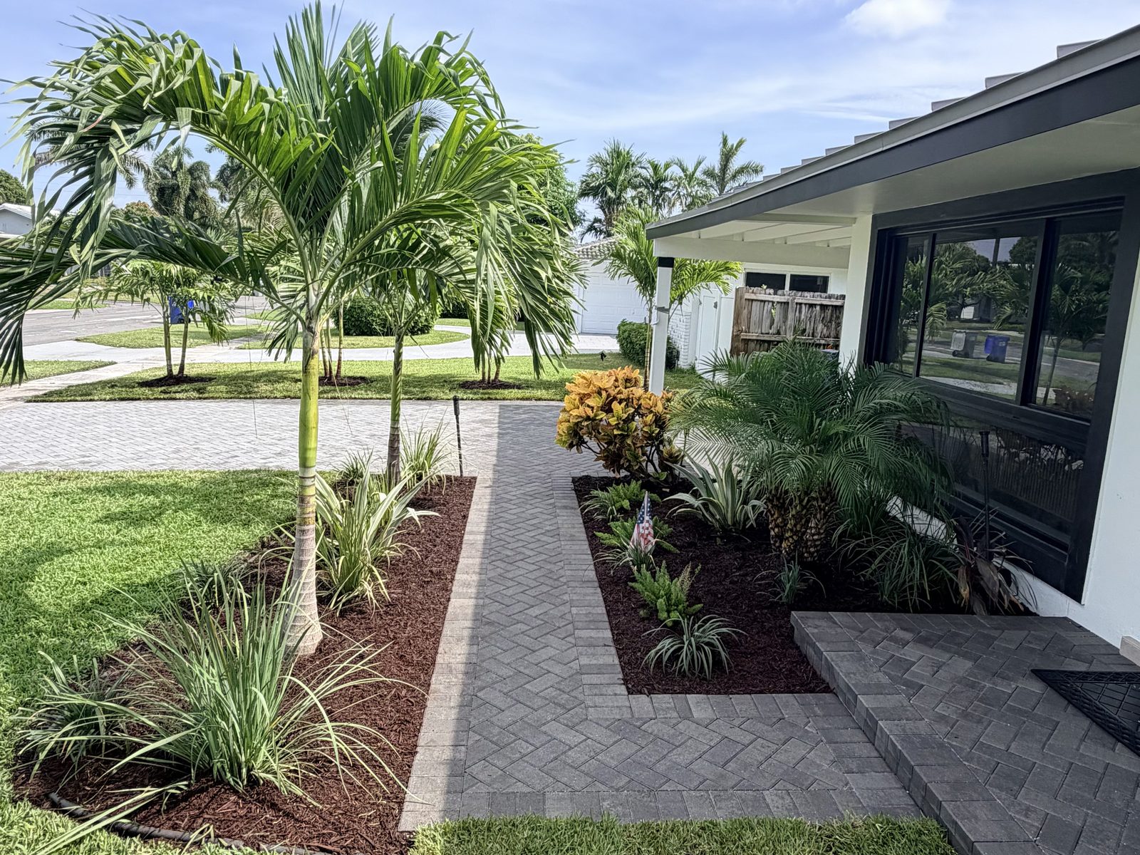Paver walkway and landscape beds